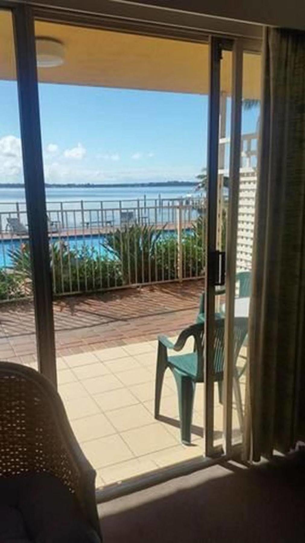 The Beachcomber Hotel & Resort, Ascend Hotel Collection Toukley Εξωτερικό φωτογραφία View of the pool from a guest room