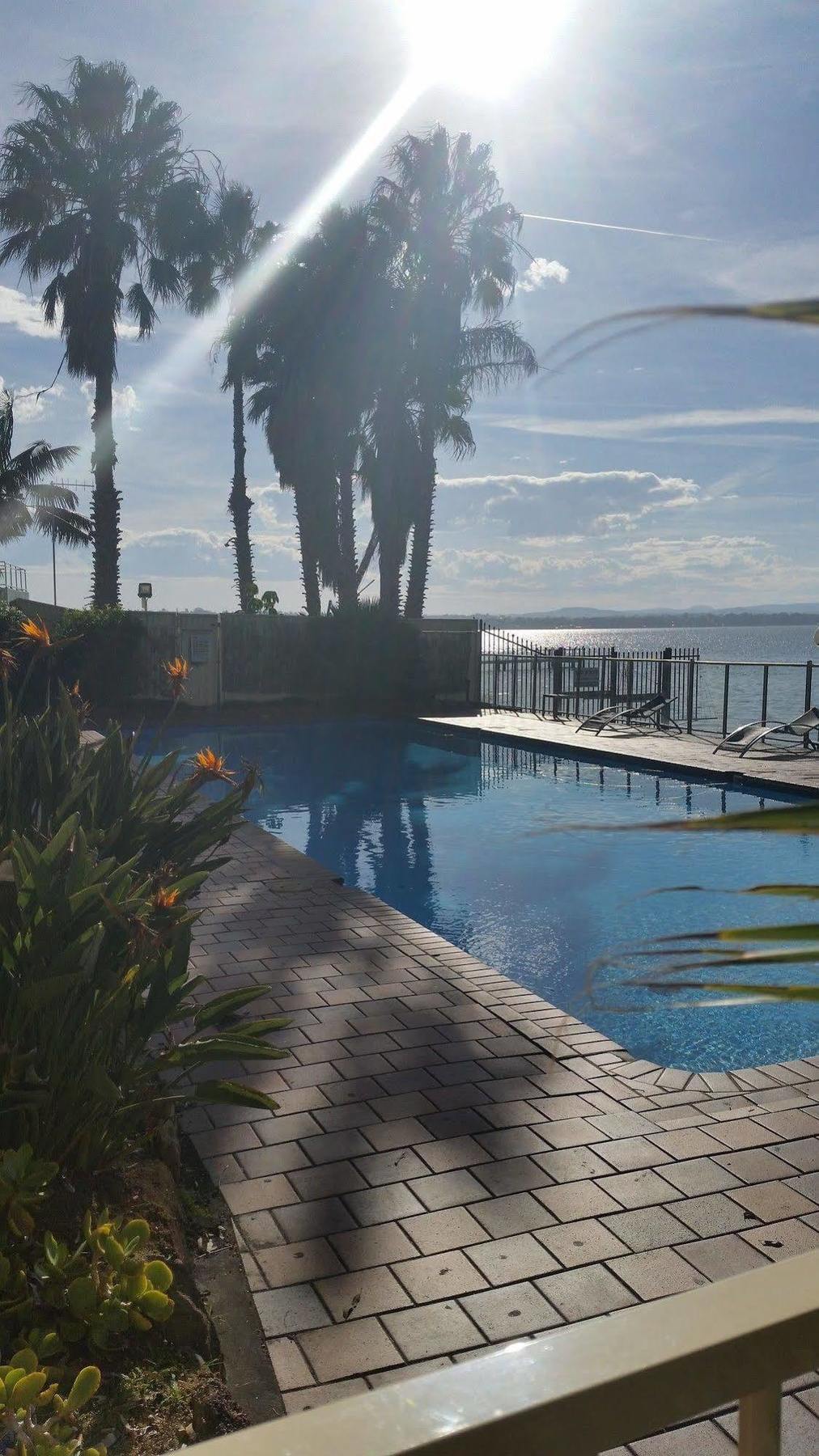 The Beachcomber Hotel & Resort, Ascend Hotel Collection Toukley Εξωτερικό φωτογραφία View of the pool at the hotel